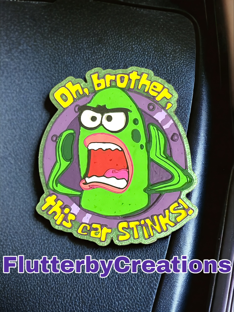 a sticker of a cartoon character on the back of a car