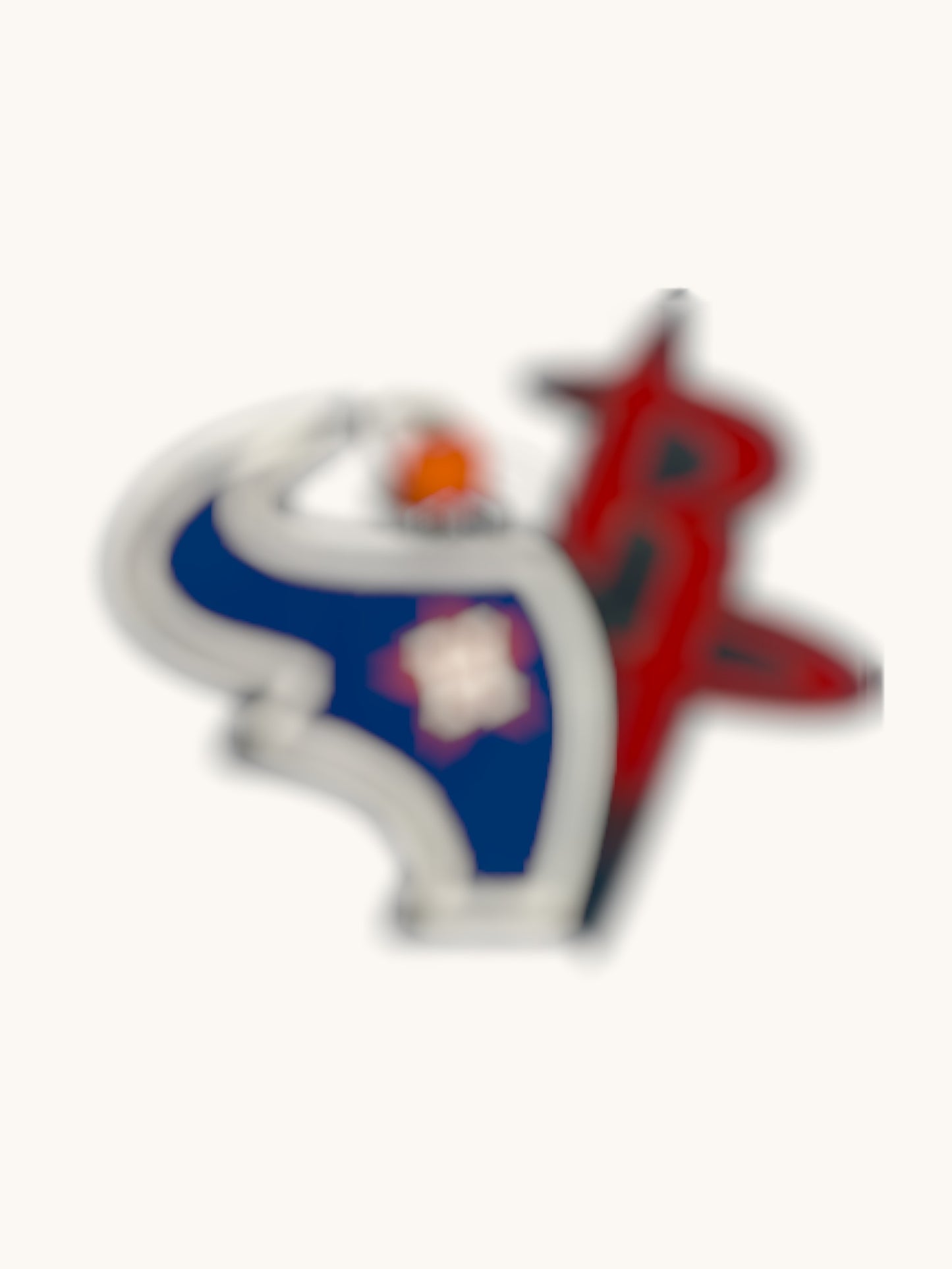 Flutterby Creations bull-shaped car freshie with blue, red, and white.