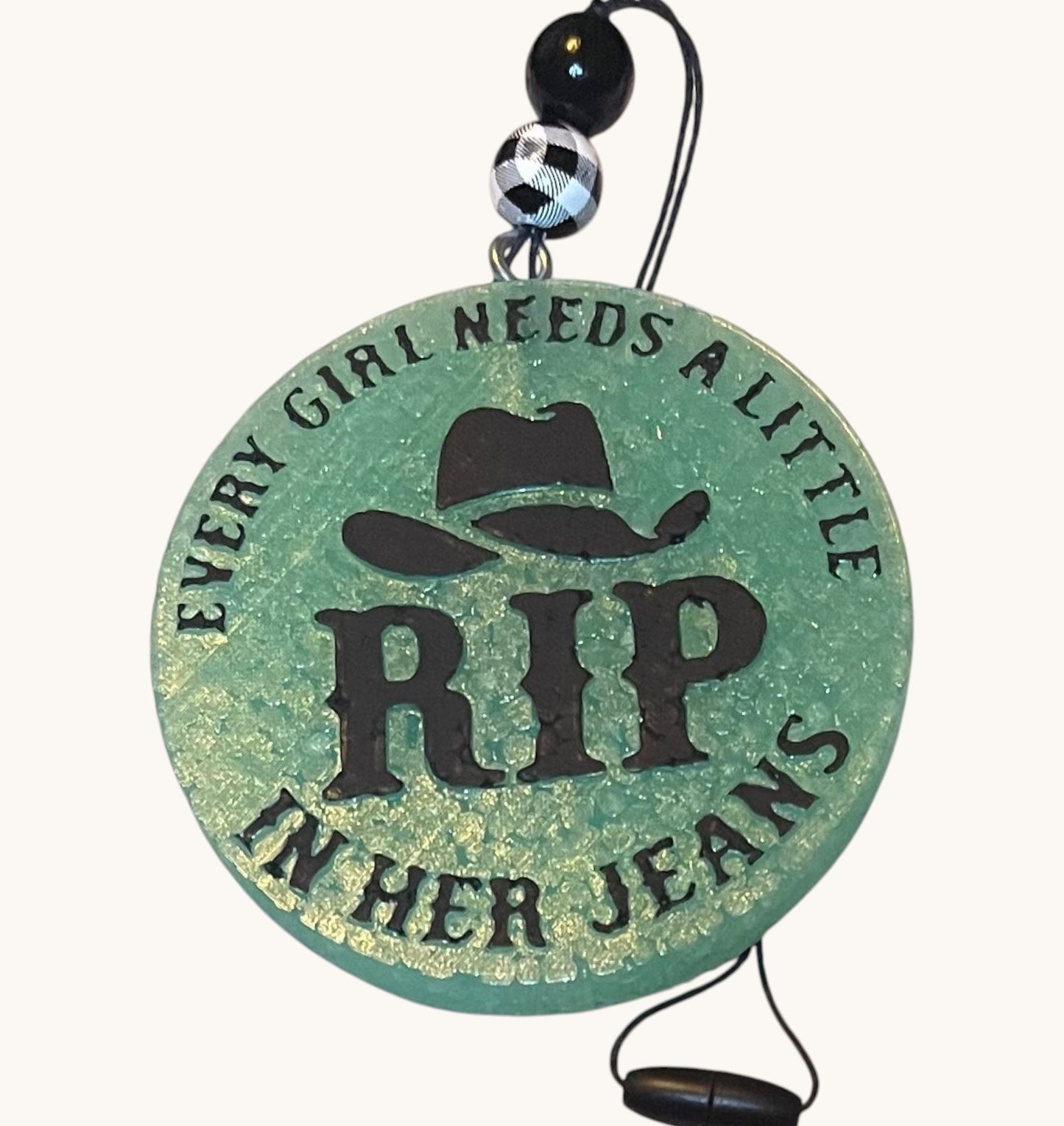 Rip In Her Jeans