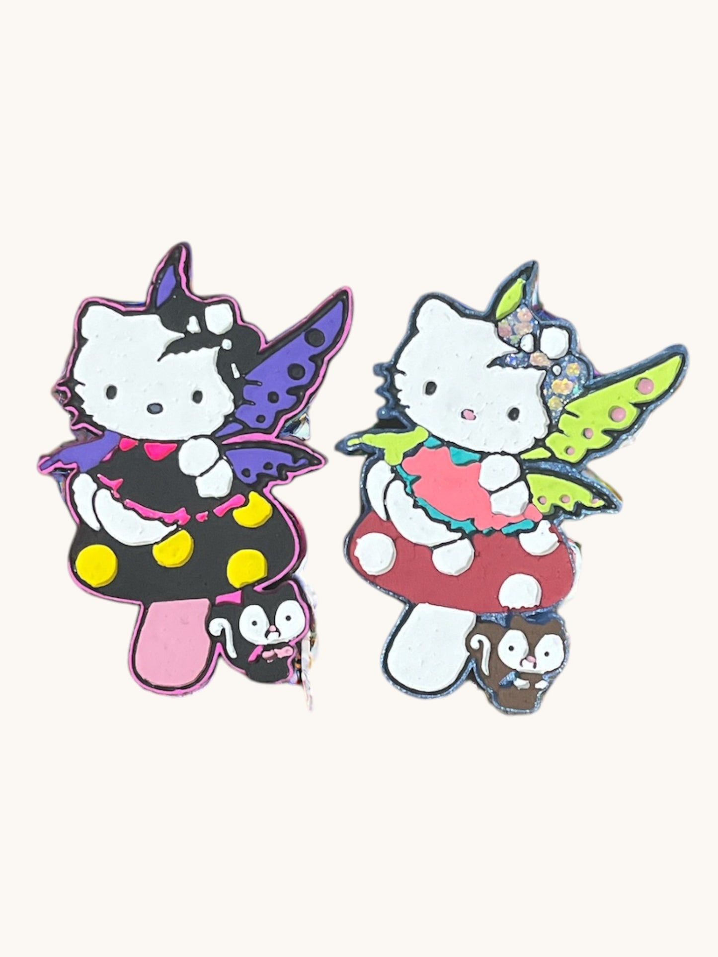 a couple of cats standing on top of a lush green field