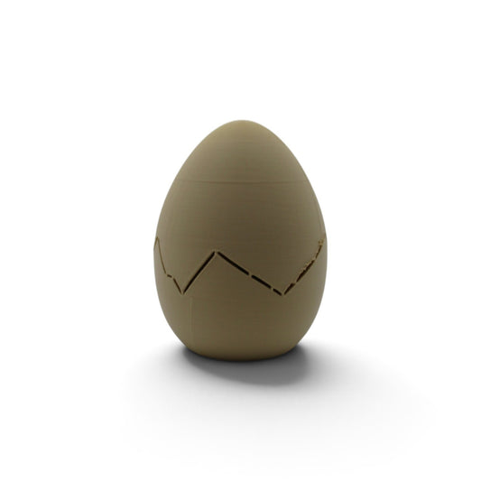 Flutterby Creations 3D printed tan mystery dinosaur egg with a cracked shell design for kids and collectors