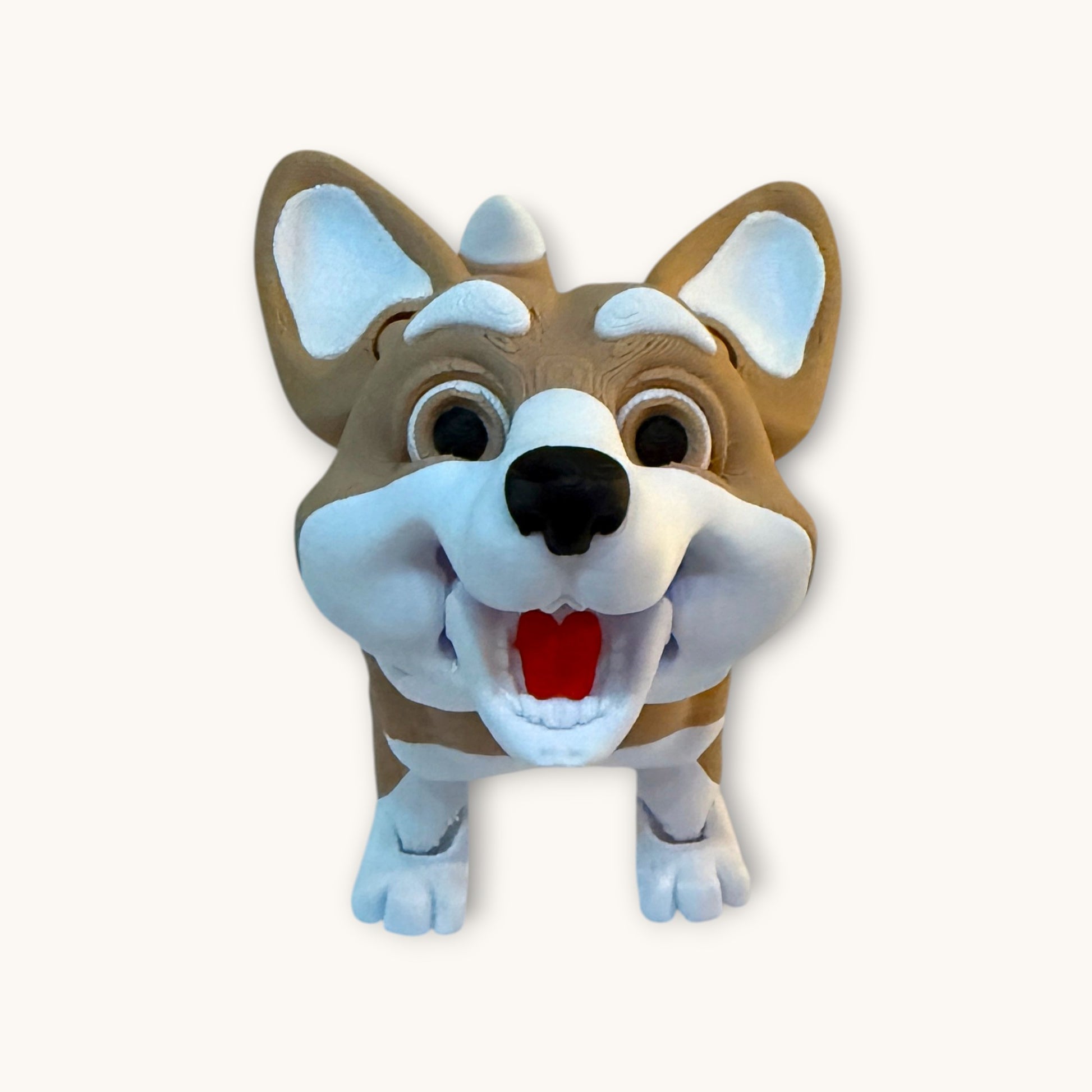 Flutterby Creations 3D printed corgi dog toy with articulated limbs and a smiling expression.