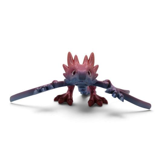 Flutterby Creations articulated Flexi Wyvern 3D print in a red and blue gradient finish with poseable wings