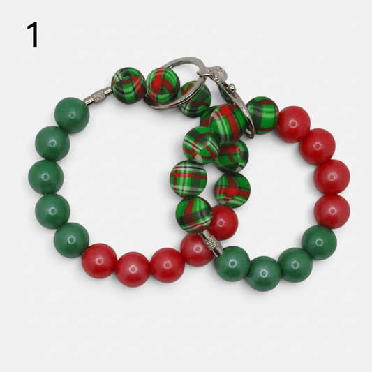 Flutterby Creations beadable wristlet car charms featuring red, green, and plaid patterned beads on metal rings.