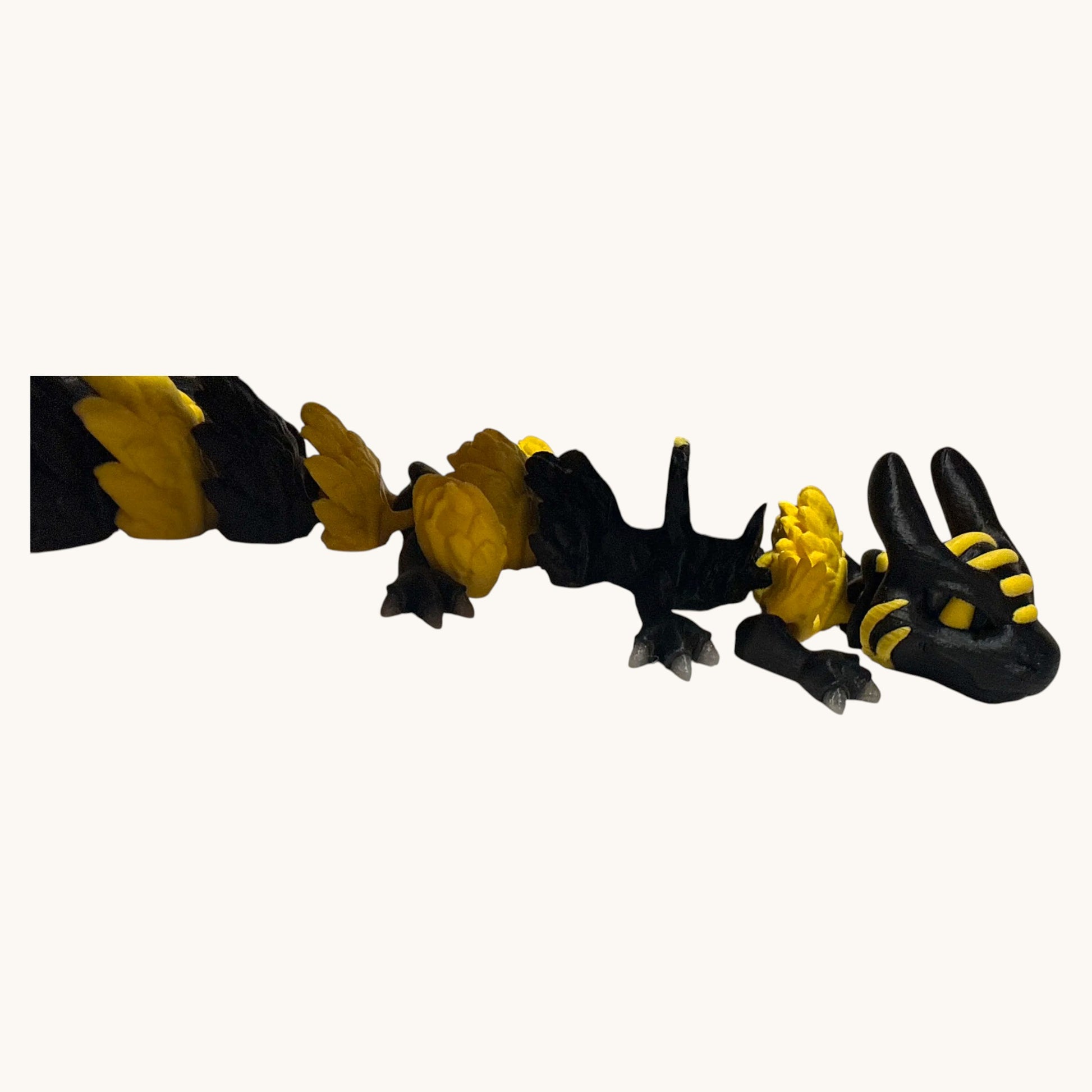 Flutterby Creations black and yellow 3D printed bee dragon with segmented body and wings. Unique fantasy collectible.