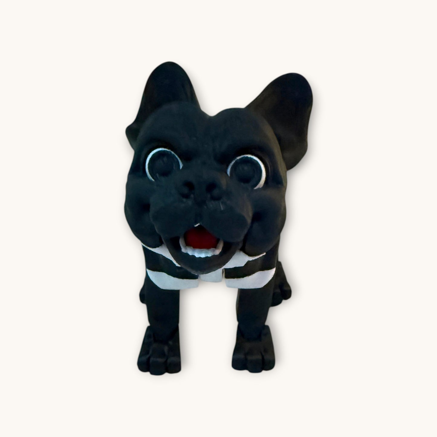 Flutterby Creations black French Bulldog figurine with white striped collar, flexible movement, and wide eyes.