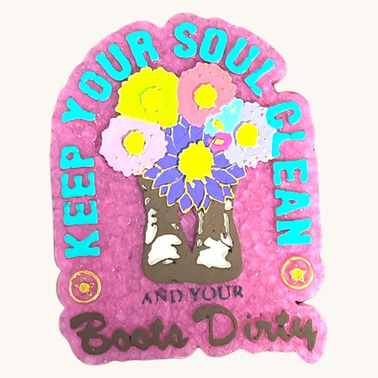 Flutterby Creations car freshie with brown boots, colorful flowers, and text 'Keep Your Soul Clean and Your Boots Dirty'.
