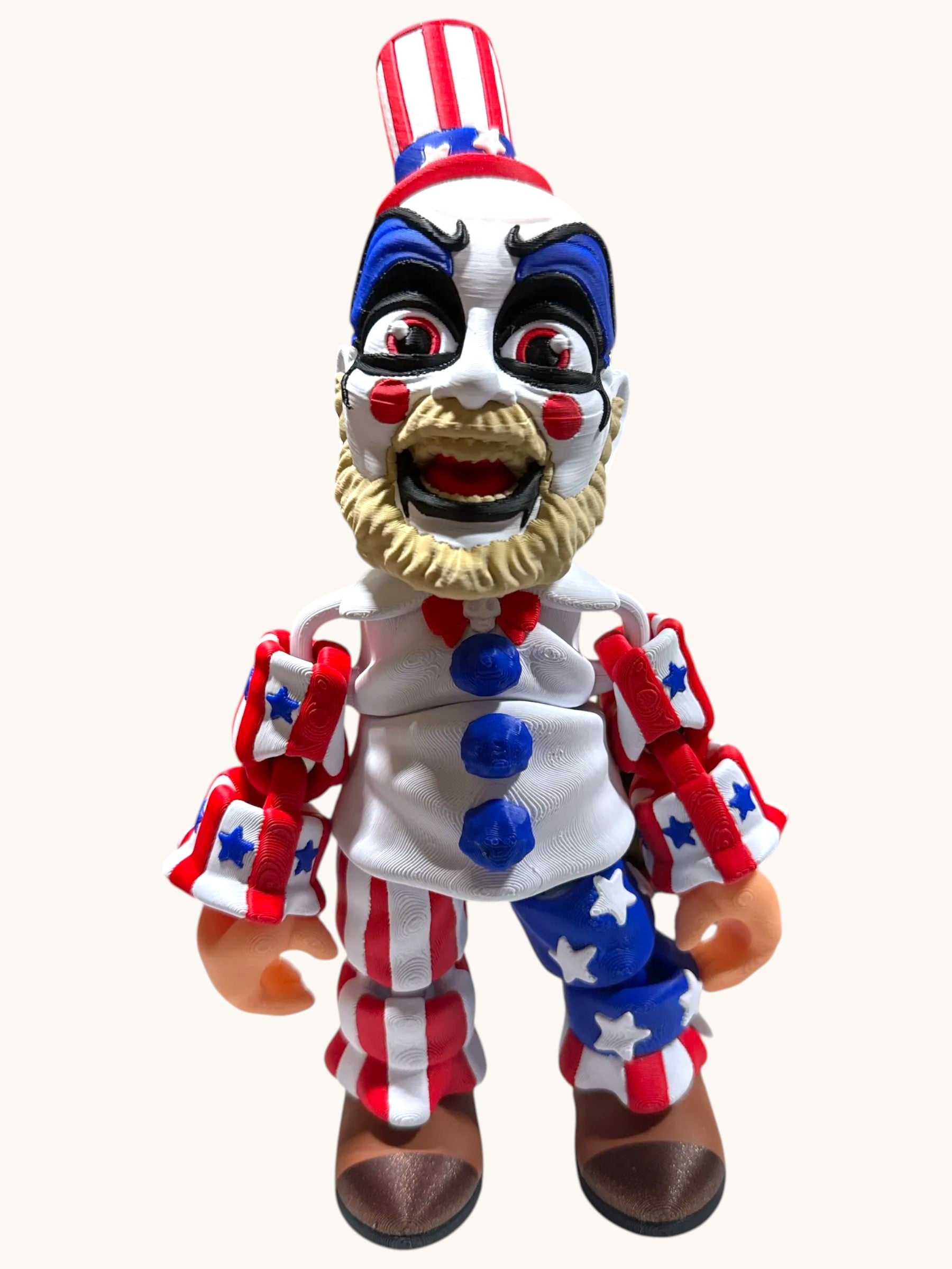 Flutterby Creations 3D printed clown figure with white, red, and blue patriotic costume, wicked grin, and detailed makeup.