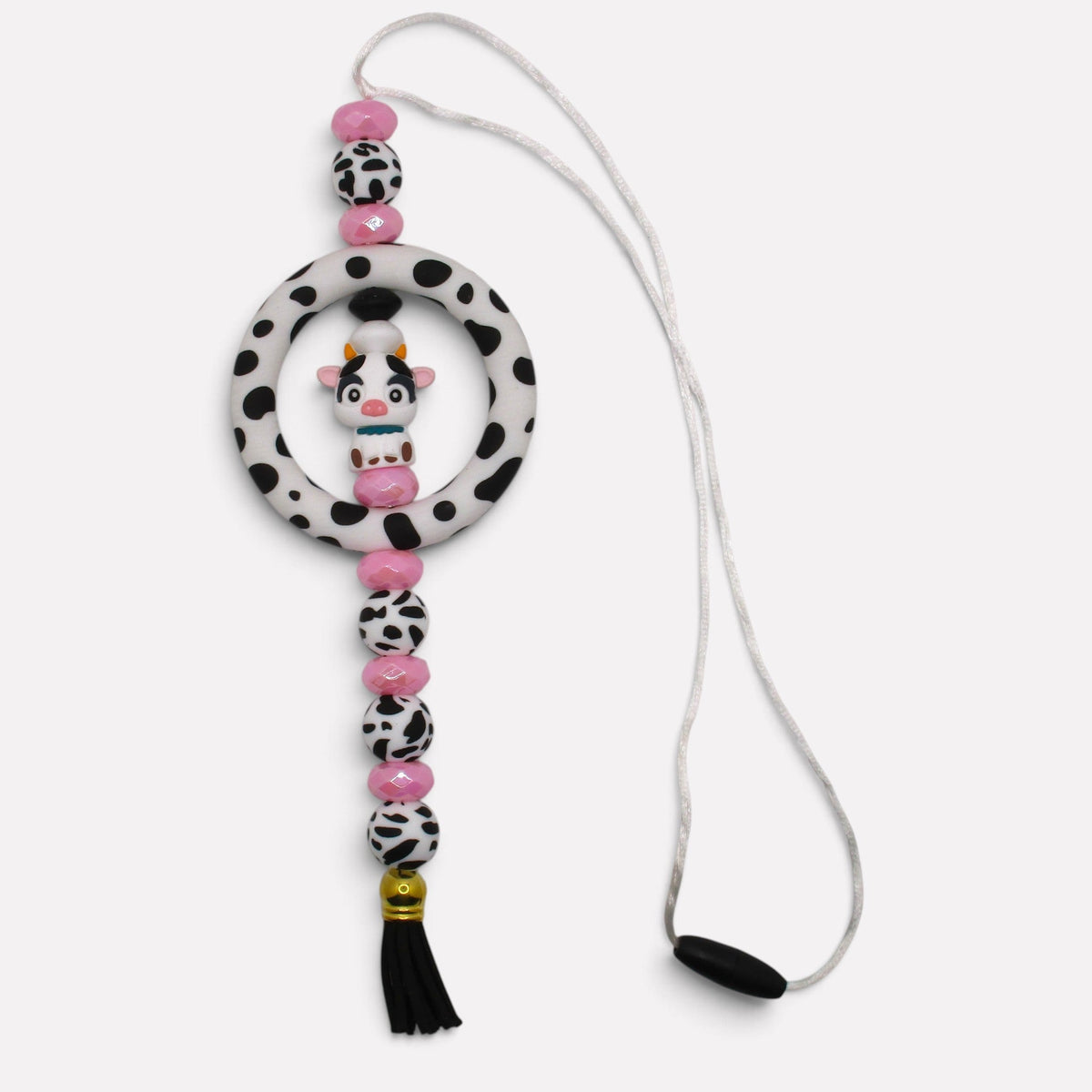 Flutterby Creations handmade beadable car charm featuring a cute cow charm, cow print beads, and pink accents.