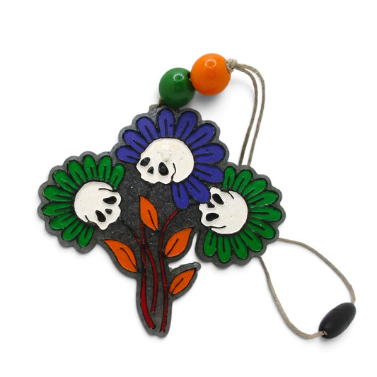 Flutterby Creations Dead Flowers car freshie featuring skull-centered purple and green floral design with orange beads