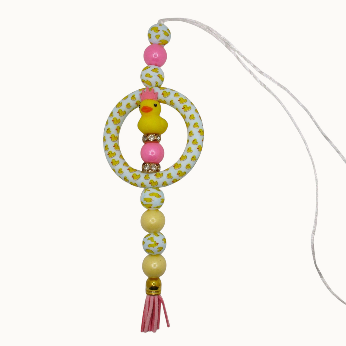 Flutterby Creations handmade beadable car charm featuring a yellow rubber duck with a pink crown and duck-patterned beads