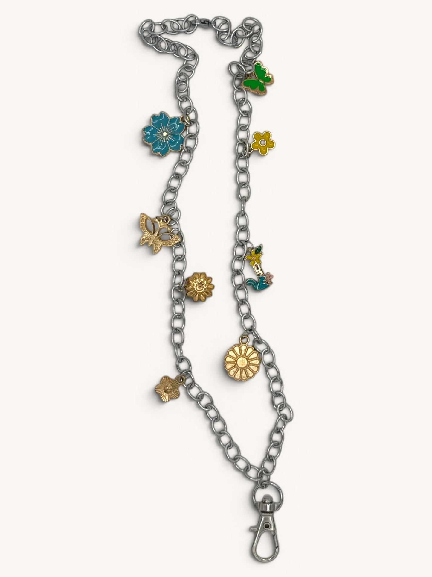Flutterby Creations Freshie Hangers with clasp and decorative charms including flowers and butterflies.
