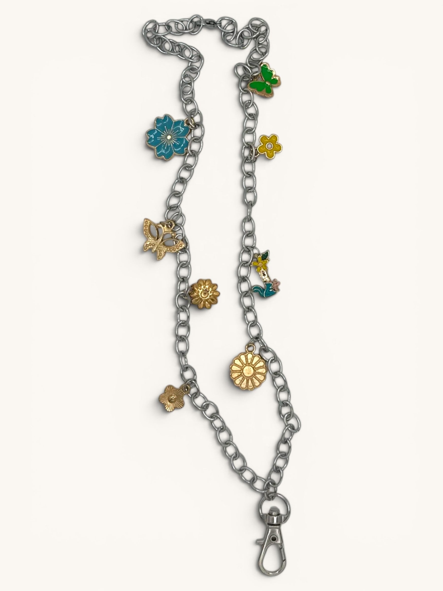 Flutterby Creations Freshie Hangers with clasp and decorative charms including flowers and butterflies.
