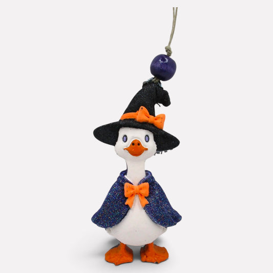 Flutterby Creations Hex Goose 3D car freshie featuring a white goose in a black witch hat and purple cape.