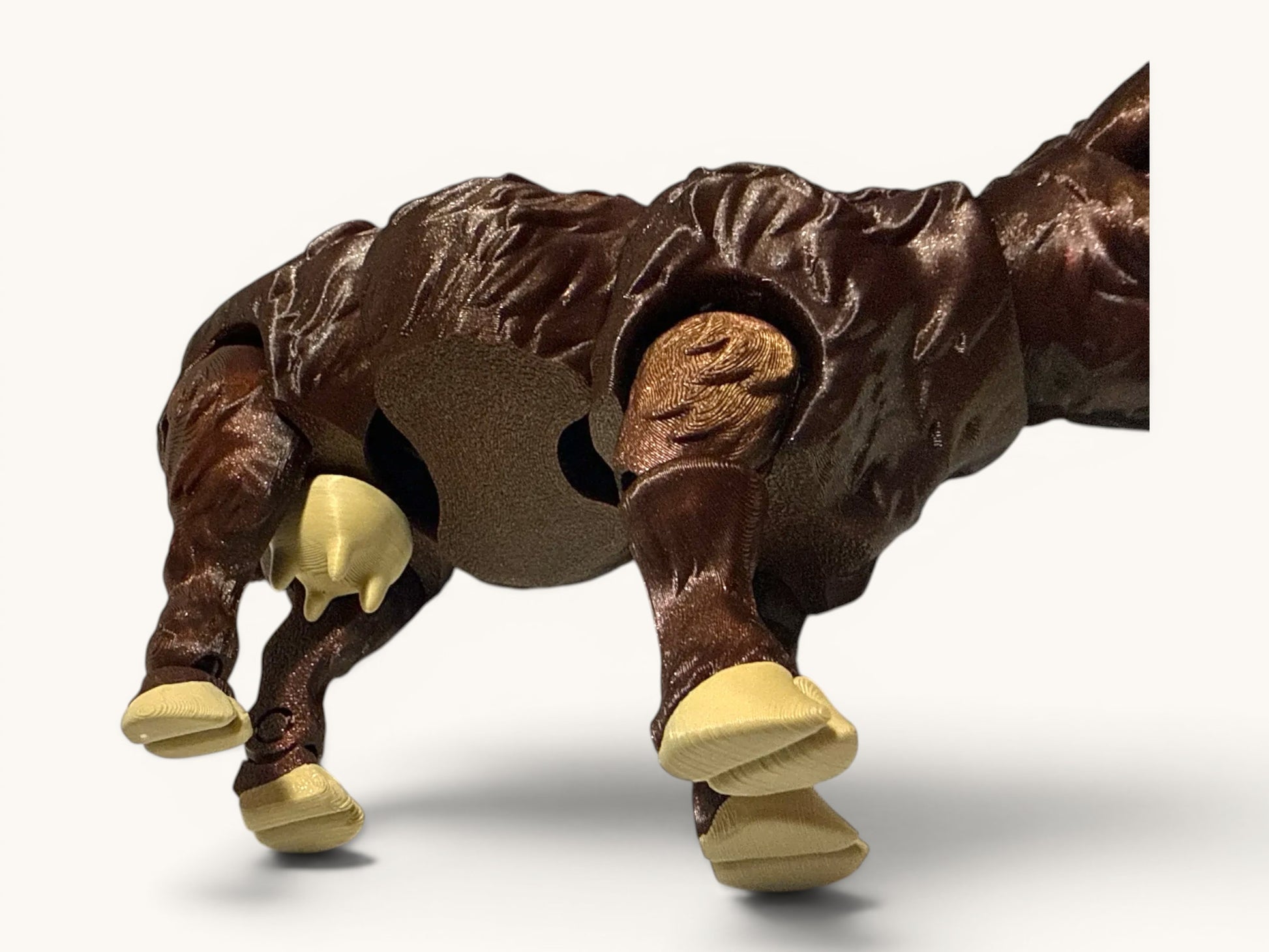 Flutterby Creations 3D printed brown highland cow figurine with beige hooves and udder.
