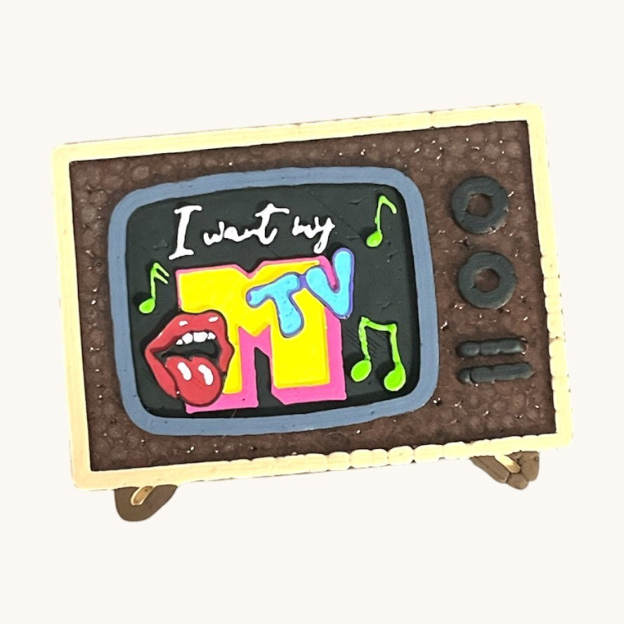 Flutterby Creations retro TV car freshie with MTV logo, red lips, and musical notes. "I want my TV" text.