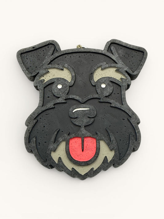Flutterby Creations Schnauzer Style car air freshener, black with grey and red accents, featuring a schnauzer dog face with tongue out.