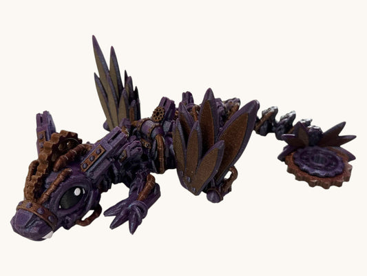 Flutterby Creations steampunk dragon figurine with intricate gears and purple crystal-like wings. The 3D printed dragon has a spinning tail.
