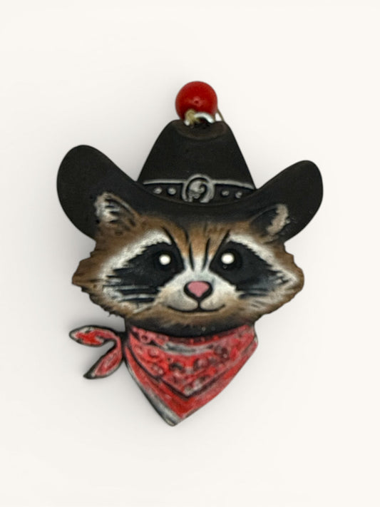 Flutterby Creations 3D raccoon freshie with cowboy hat and red bandana. Fun western car accessory.