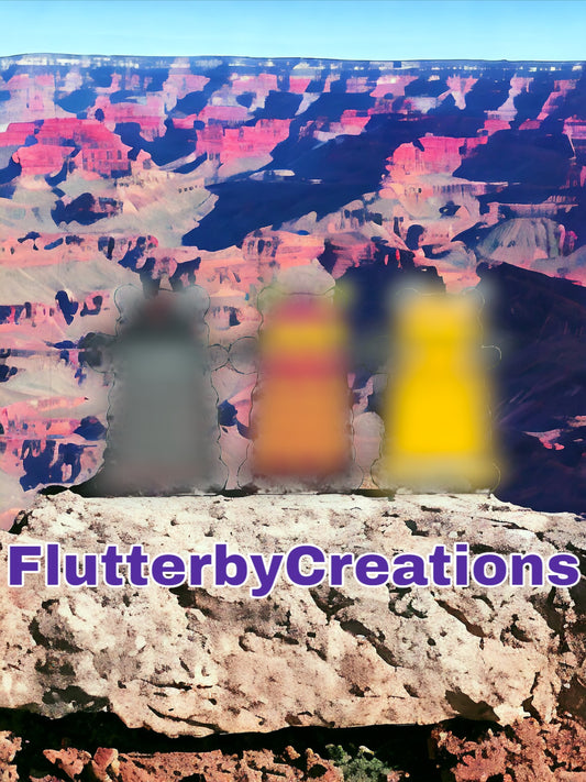 Flutterby Creations Mechanized Menace car freshie, inspired by sci-fi robots, in black, red, and yellow.